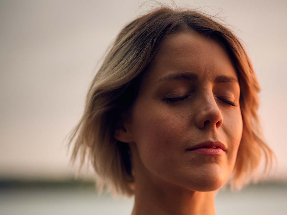 close-up of woman with eyes closed